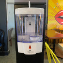 Support avec distributeur pour désinfectant